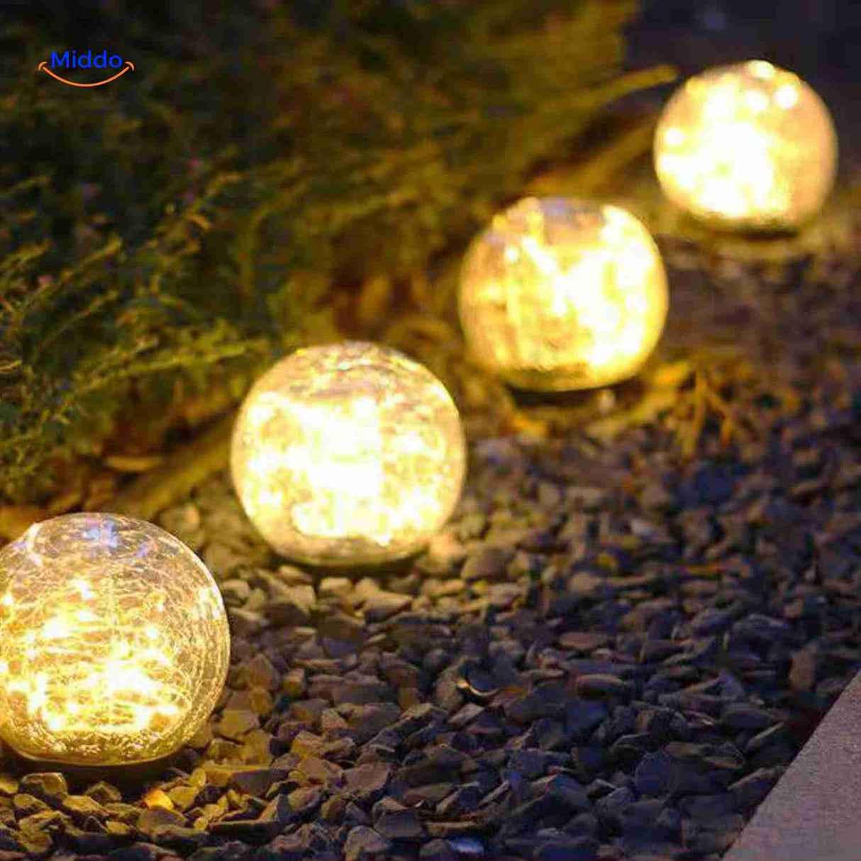 Solvion ambient garden lamp illuminating gravel pathway at dusk.