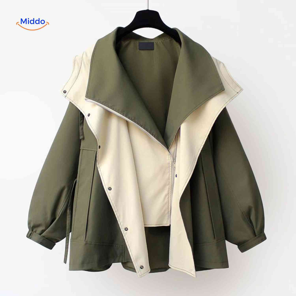 AquaShell oversized trench coat in forest green with cream collar detail.