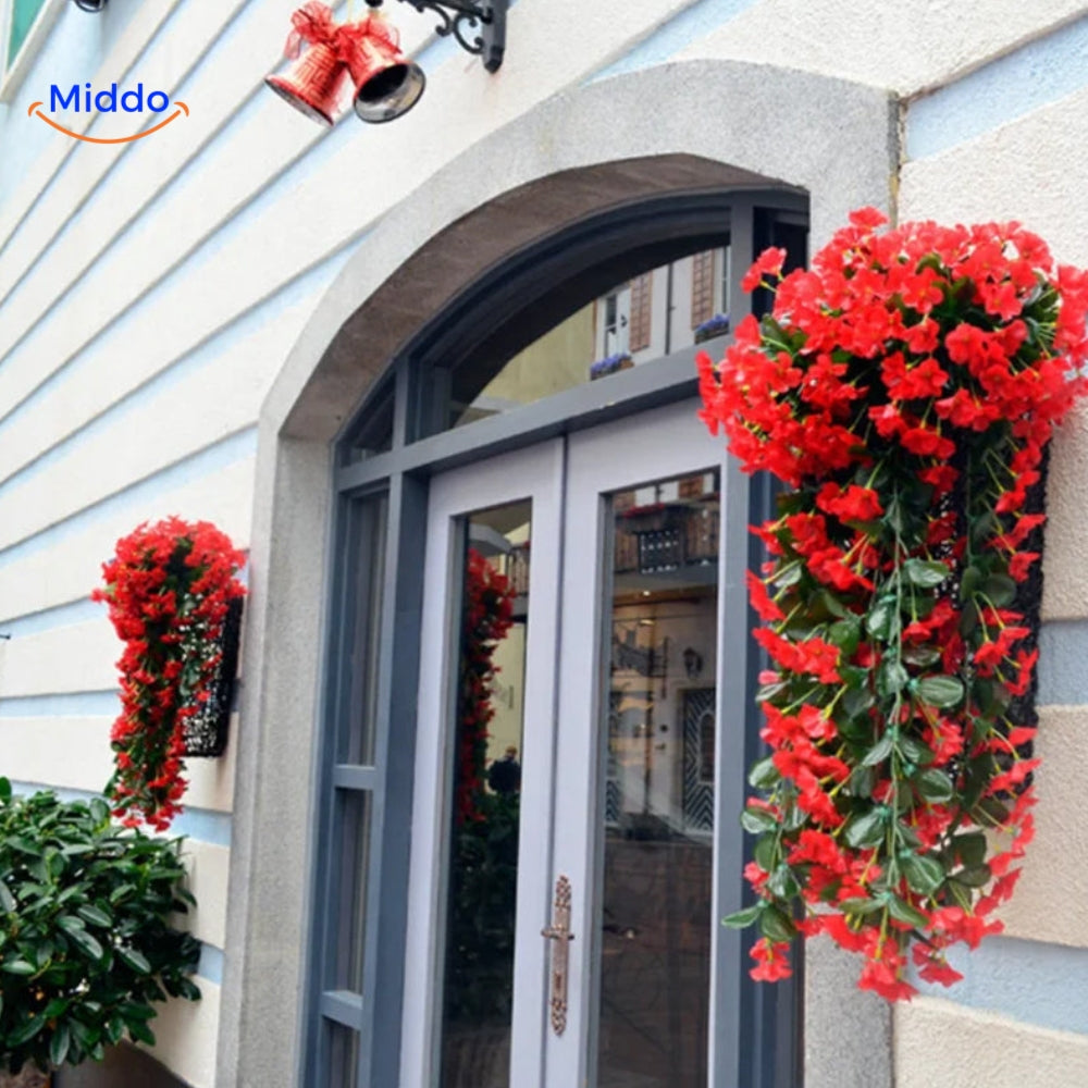 Artificial orchids creating a welcoming display at the front entrance.