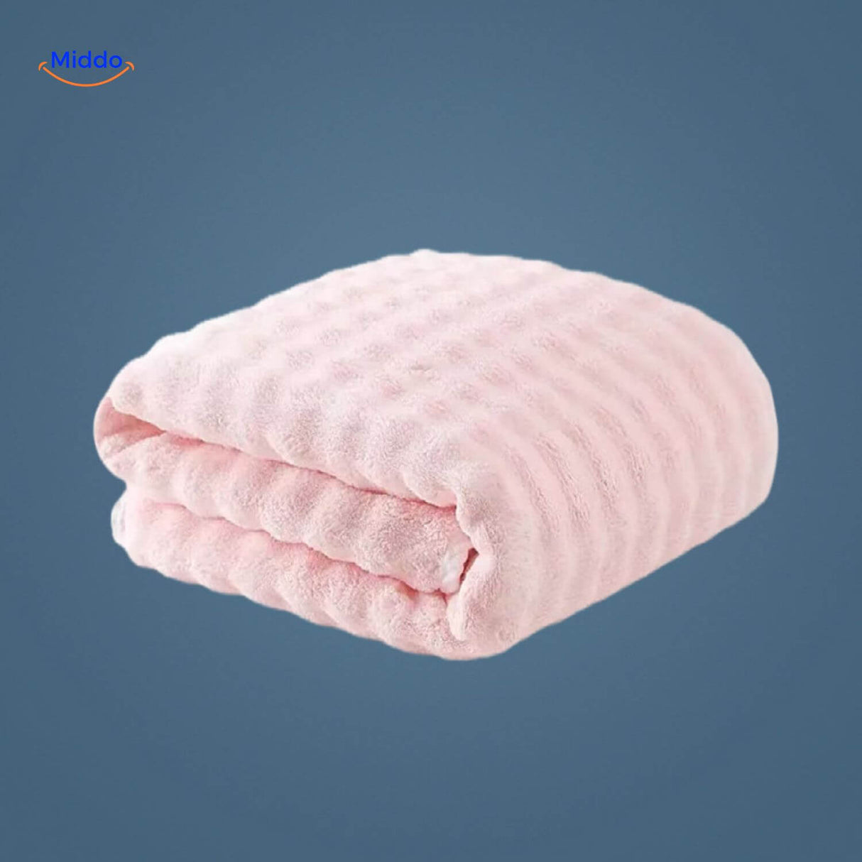 Pink waffle-textured bath towel with superior absorbency.