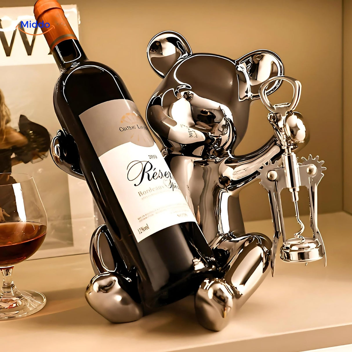 Silver-finished bear wine bottle holder with built-in corkscrew, combining decoration and practical function.