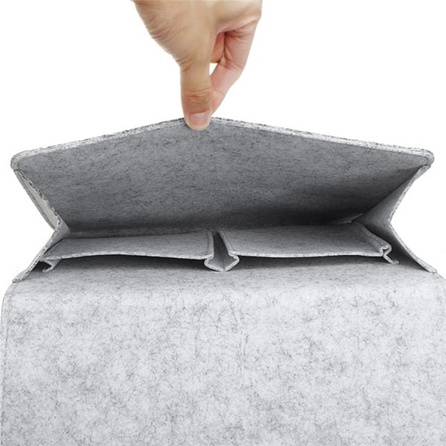 BedCaddy felt bedside organizer with anti-slip base in light gray.