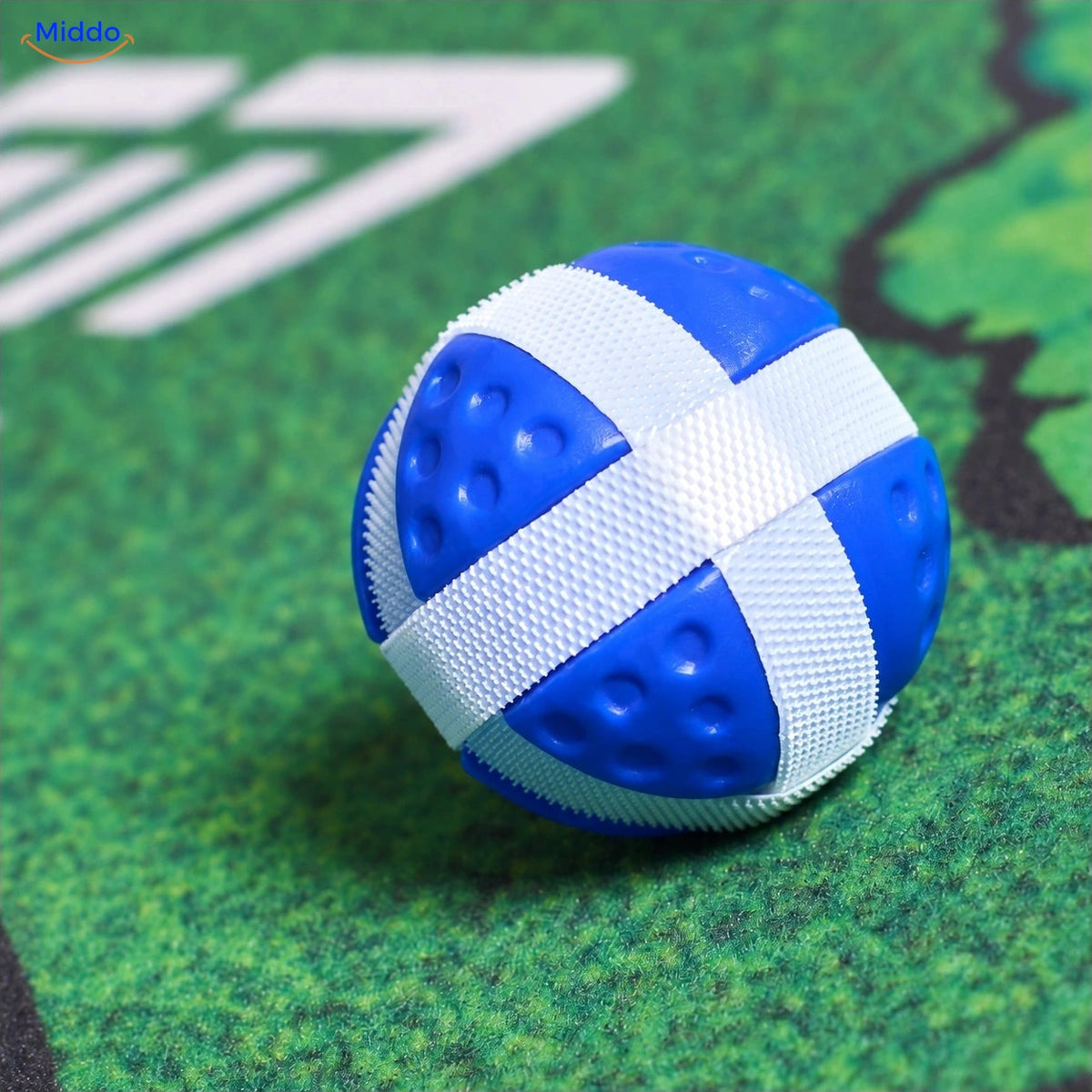 Blue GolfMaster hook-and-loop practice ball on the target