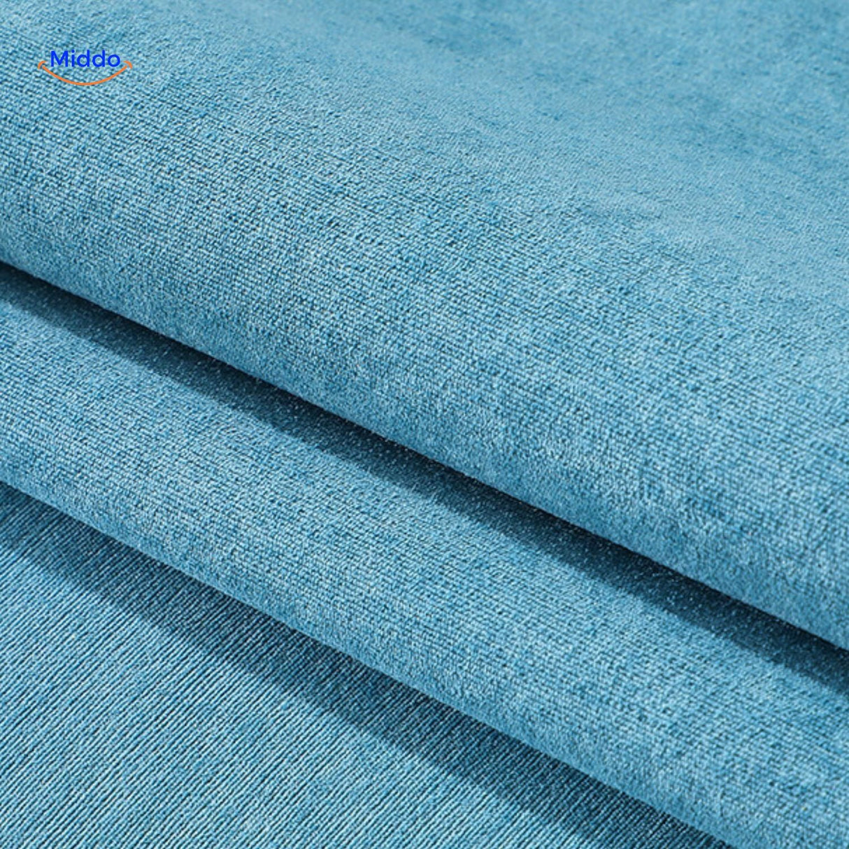 Blue chenille sofa cover close-up, displaying plush texture and water-repellent fabric properties.