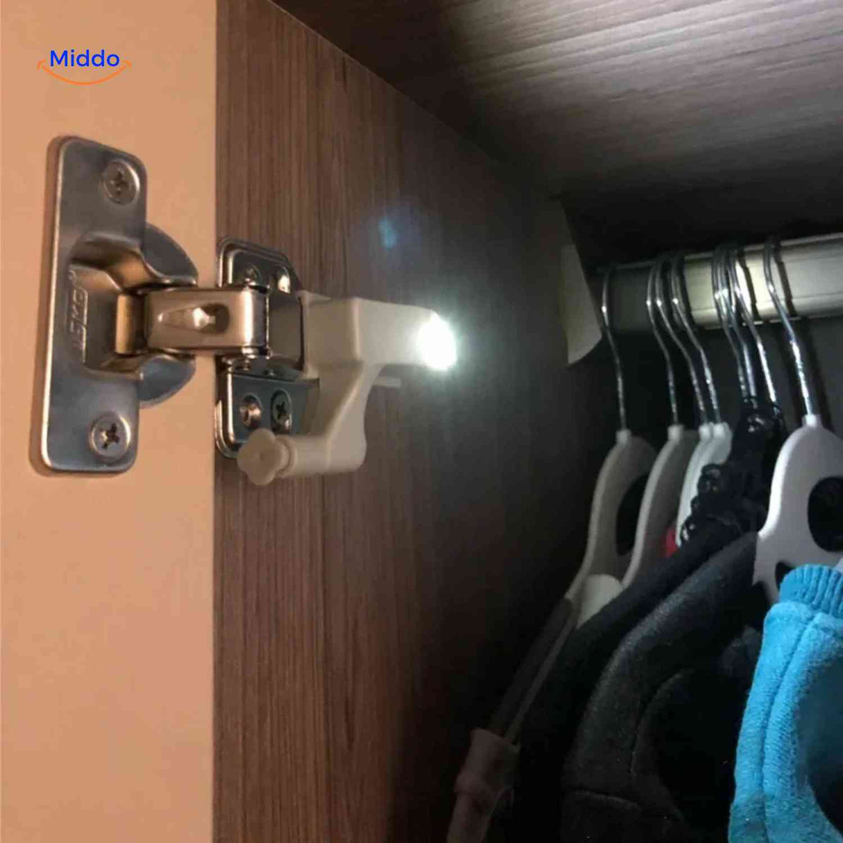 Bright white LED light activates automatically when cabinet door opens with hinge sensor.