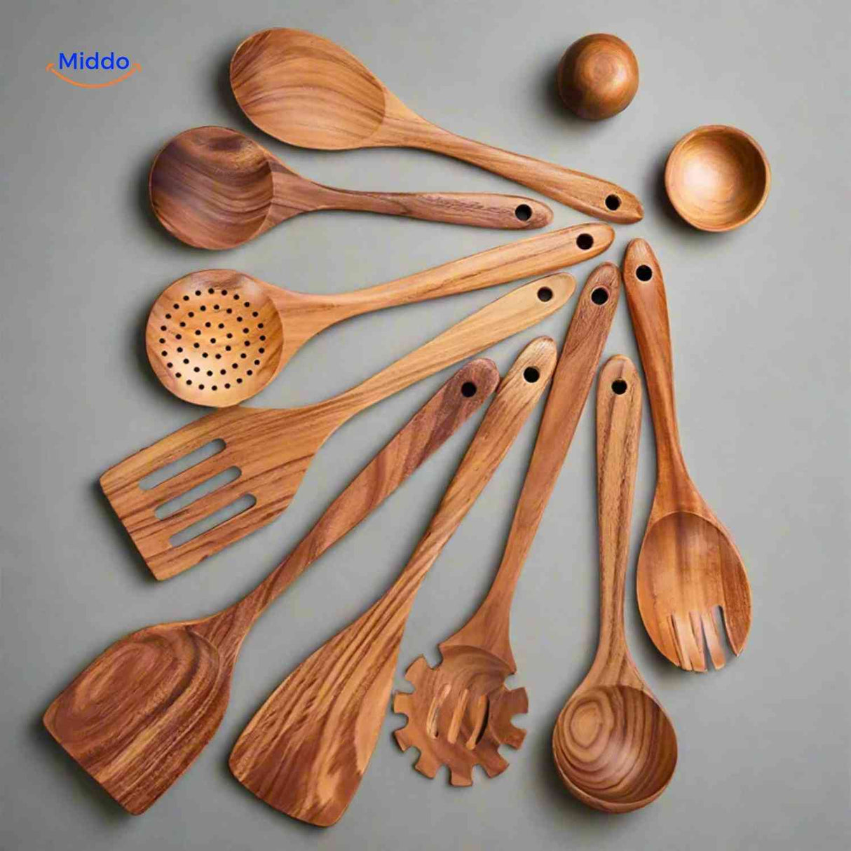Classic wooden kitchen utensil set featuring heat-resistant teak spoons and spatulas.