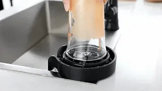 CleanTap glass cleaner in use