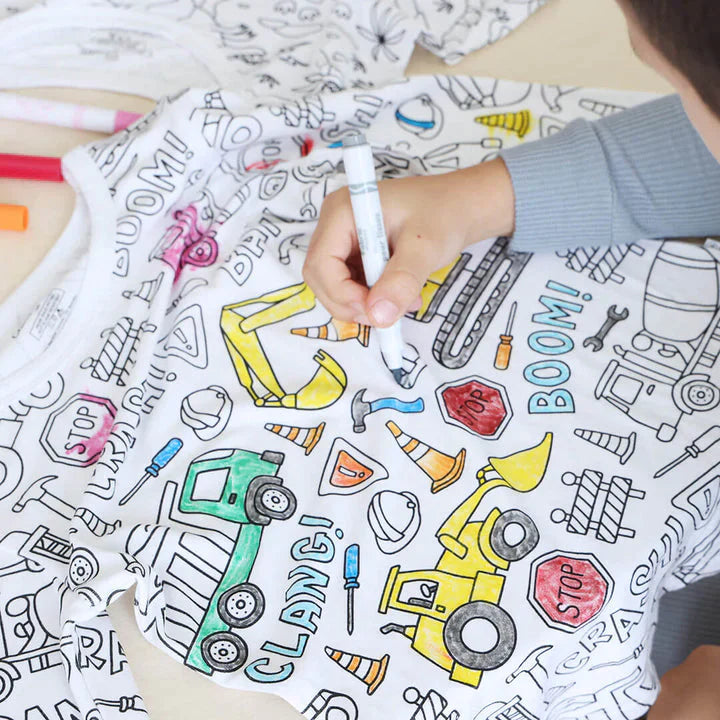 Vehicle-theme color-your-own pajama being colored by boy.