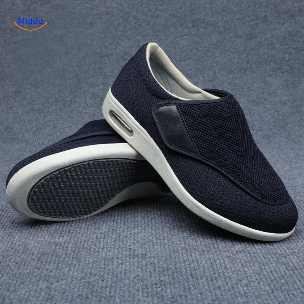 Navy blue therapeutic shoes with secure velcro strap support.