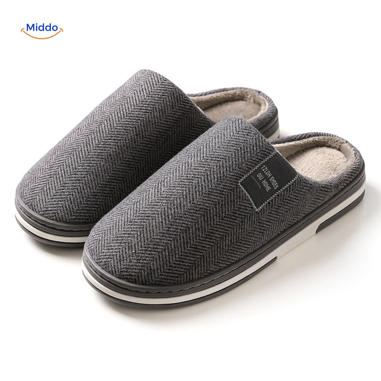 Close-up texture view of dark gray non-slip slippers.