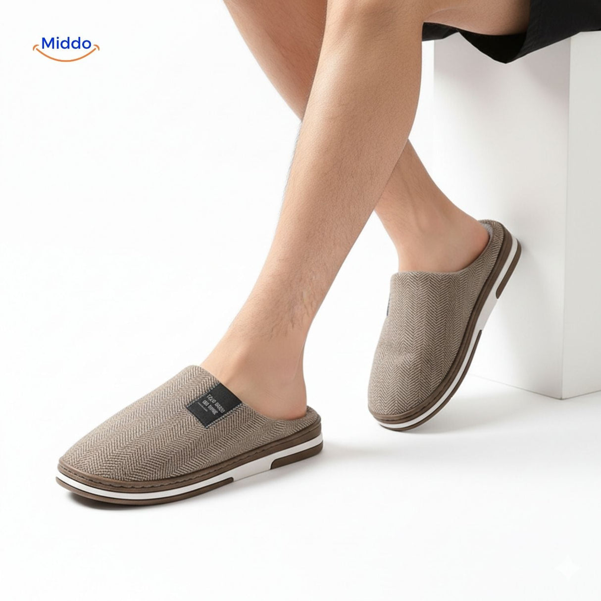 Dark gray house slippers with sturdy non-slip rubber sole.