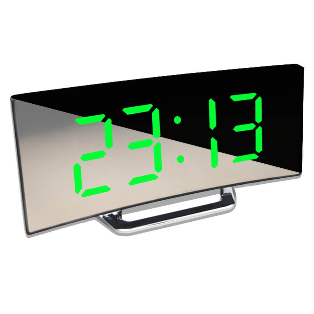Close-up of green LED display showing time 23:13 on curved digital alarm clock.