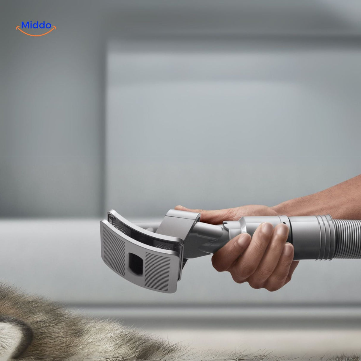 Dog grooming brush with compatible vacuum nozzle attachment.