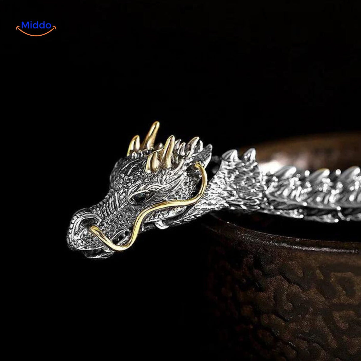 Dragon head bracelet on yellow background in vibrant product display.