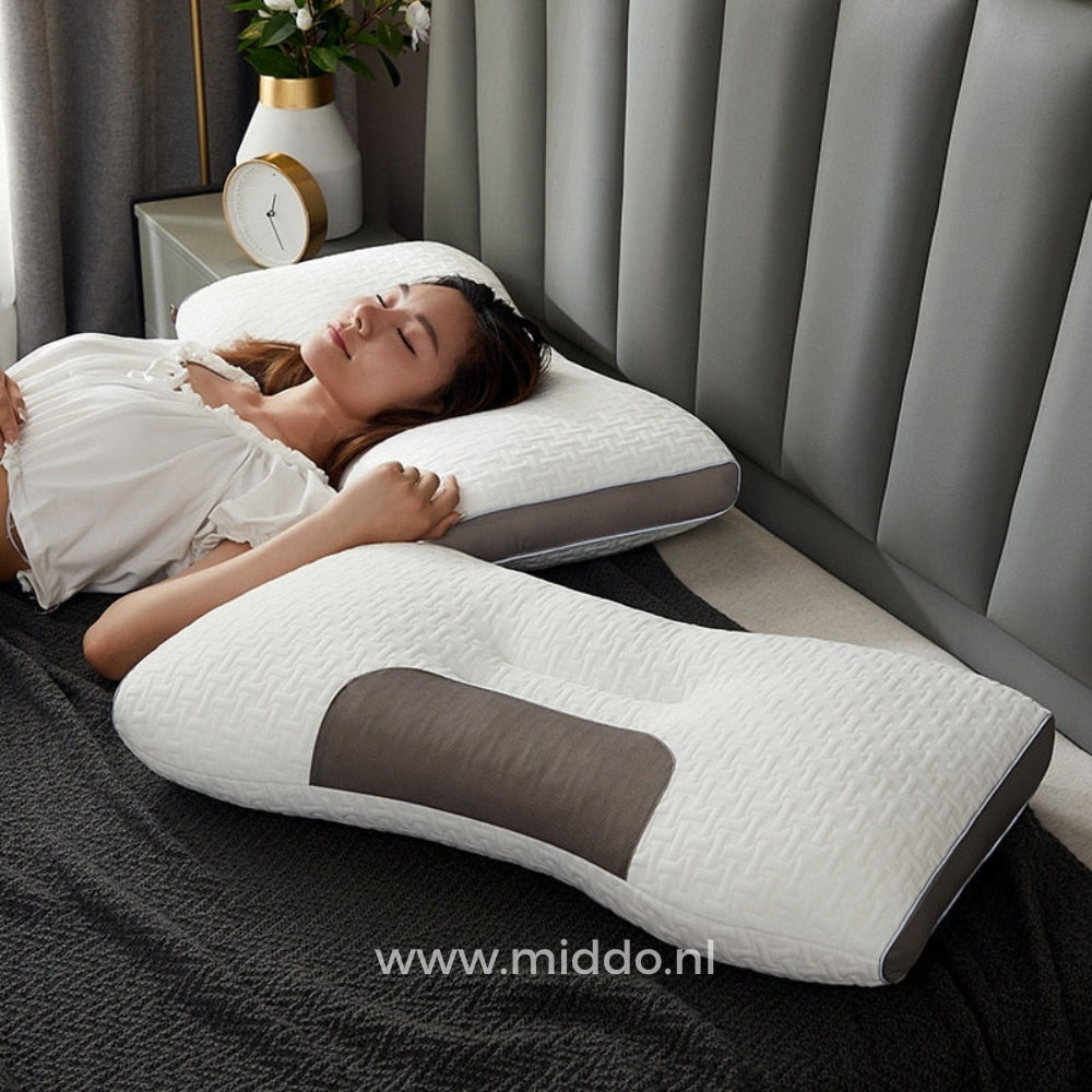Ergonomic neck support pillow positioned for optimal sleeping comfort and support