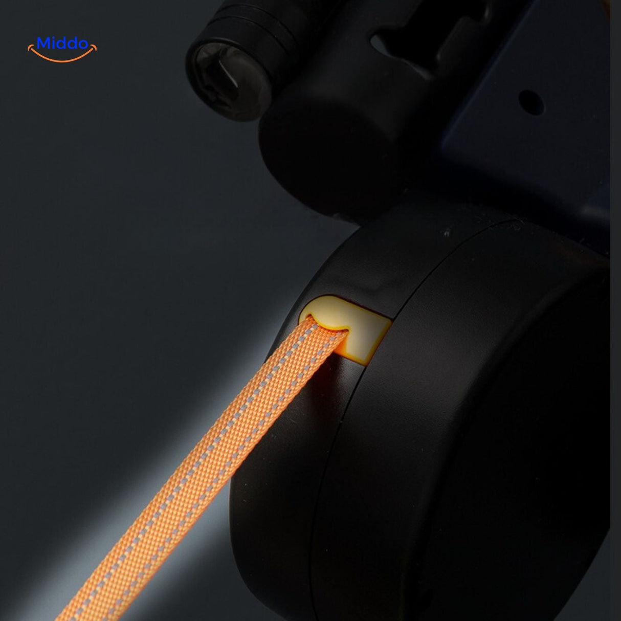 Extended retractable leash in low light conditions with visibility features.