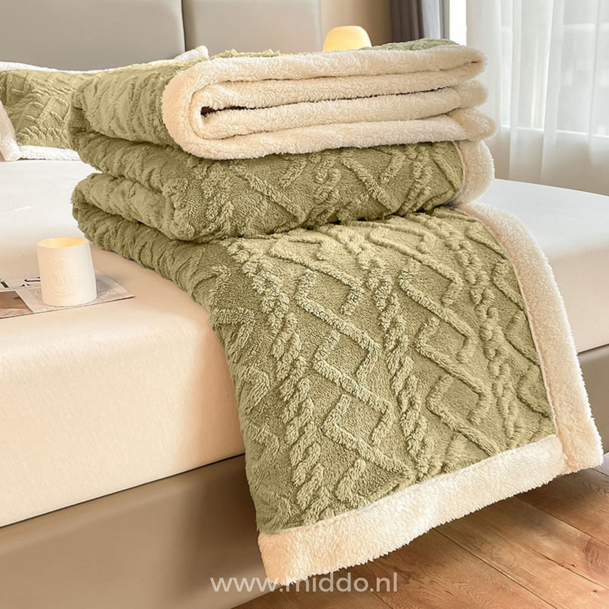 Fleece fitted sheet folded display showing thickness quality.