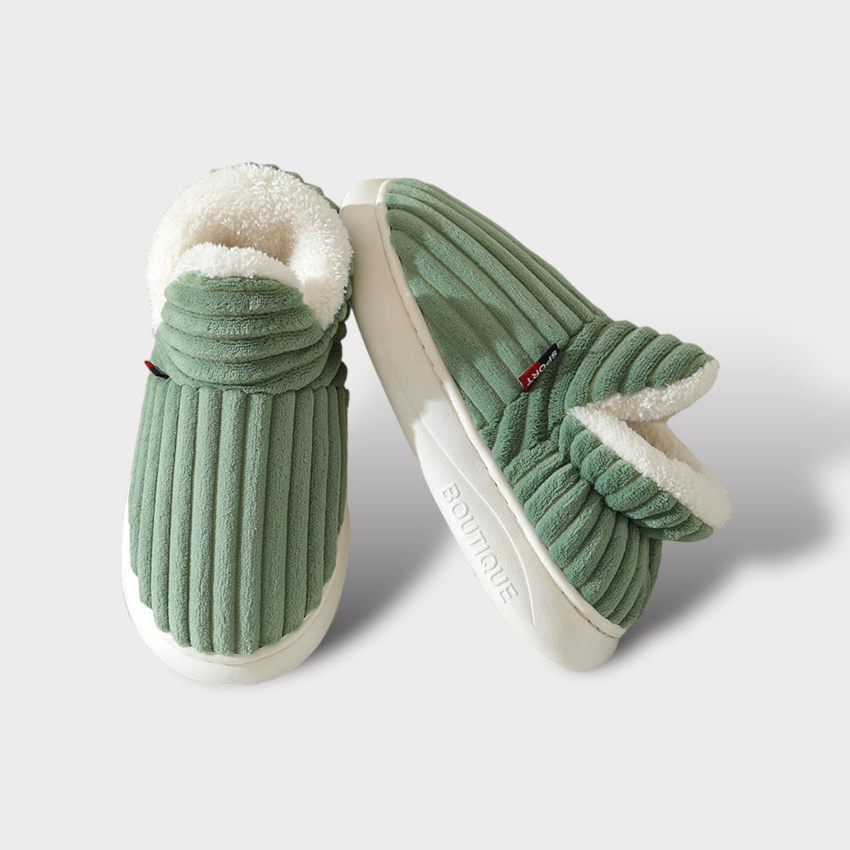 Close-up lifestyle view of green therapeutic slippers showing comfort and quality construction.
