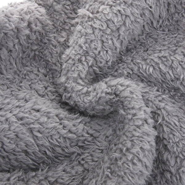 Detailed close-up of FluffSoks soft plush interior fabric composition.