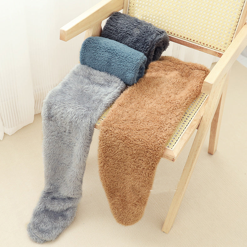 FluffSoks cozy socks available in multiple warm color options.