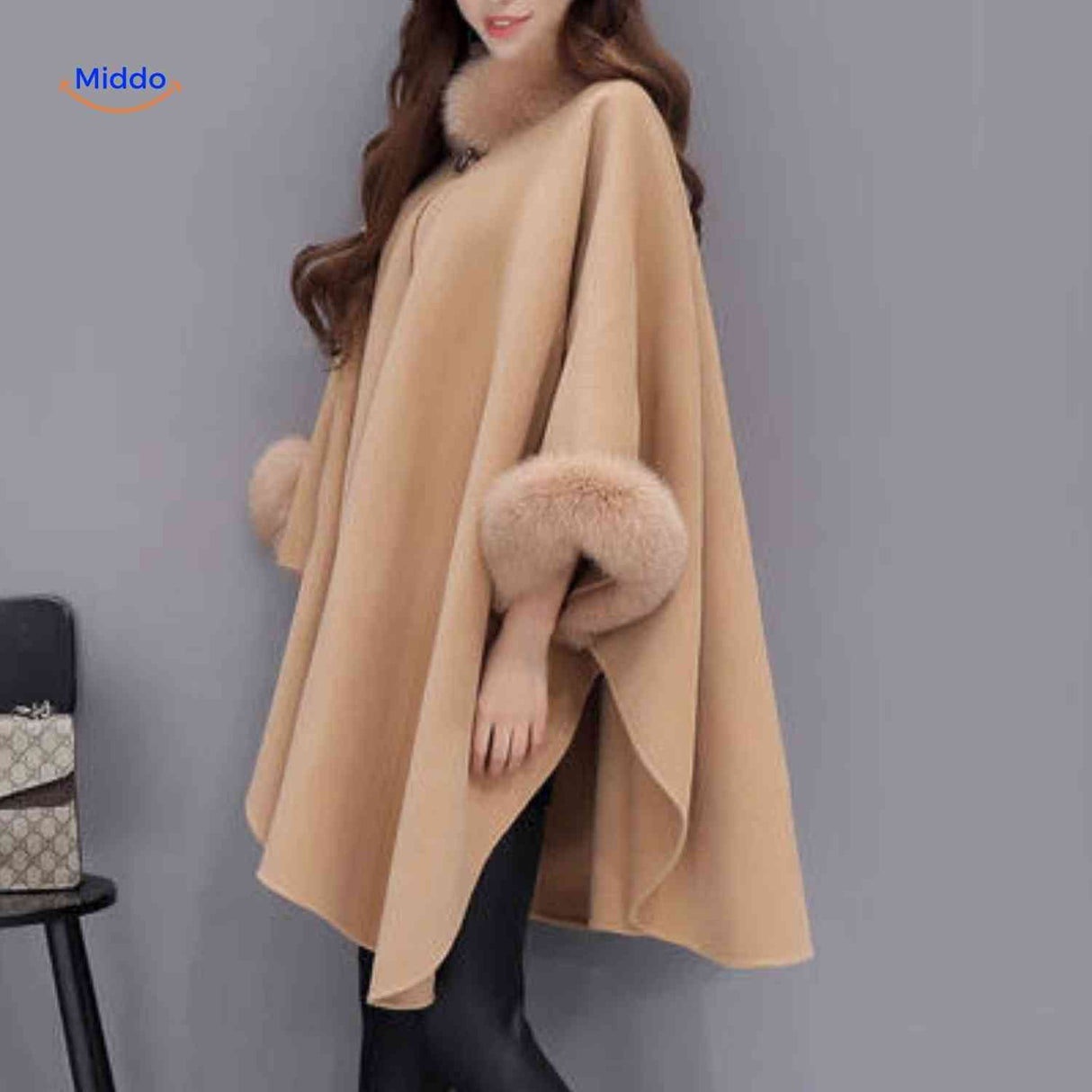 Furina cape coat with matching faux-fur collar and decorative fur cuff details.