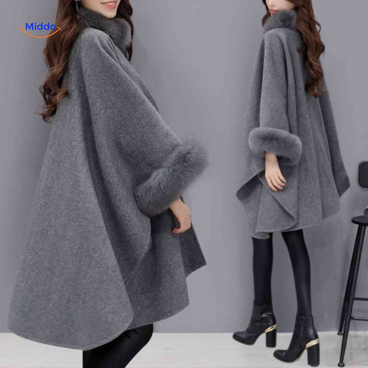 Back view of Furina wool cape coat revealing structured design and faux-fur collar trim.