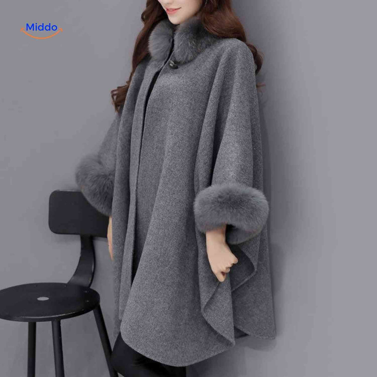 Furina wool cape coat in gray with elegant faux-fur collar trim and comfortable fit.