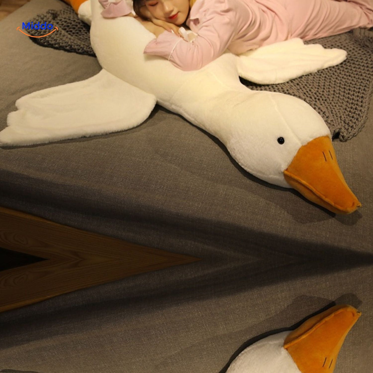 Goosy plush goose with soft oversized wings and cute big feet details.