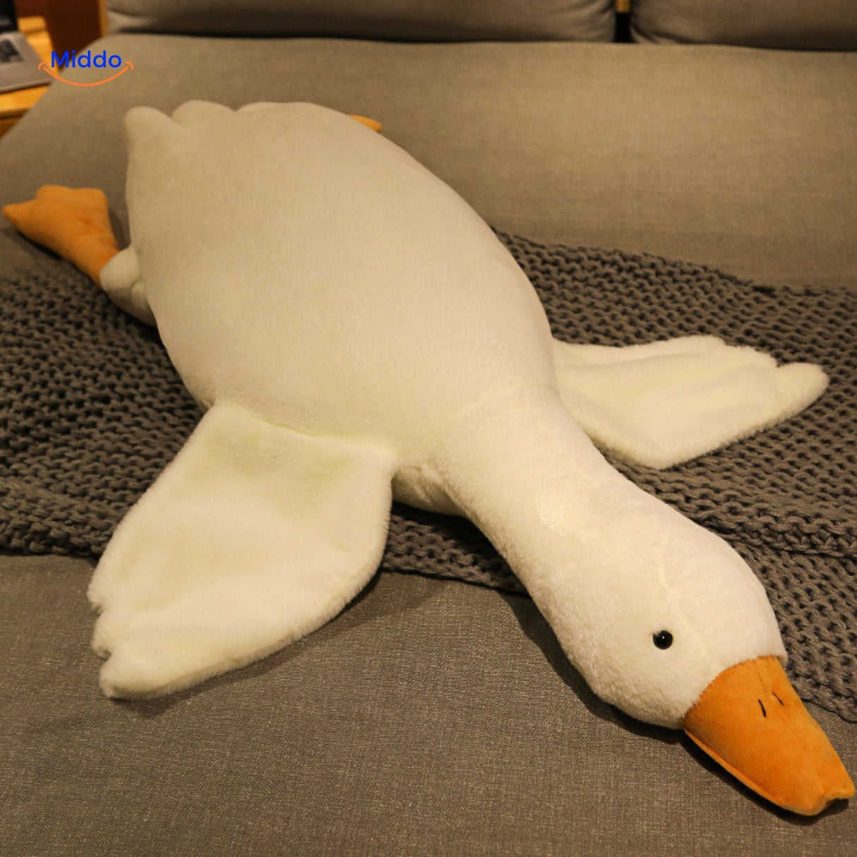 Goosy plush goose with distinctive large ears and soft features for cozy sleep.