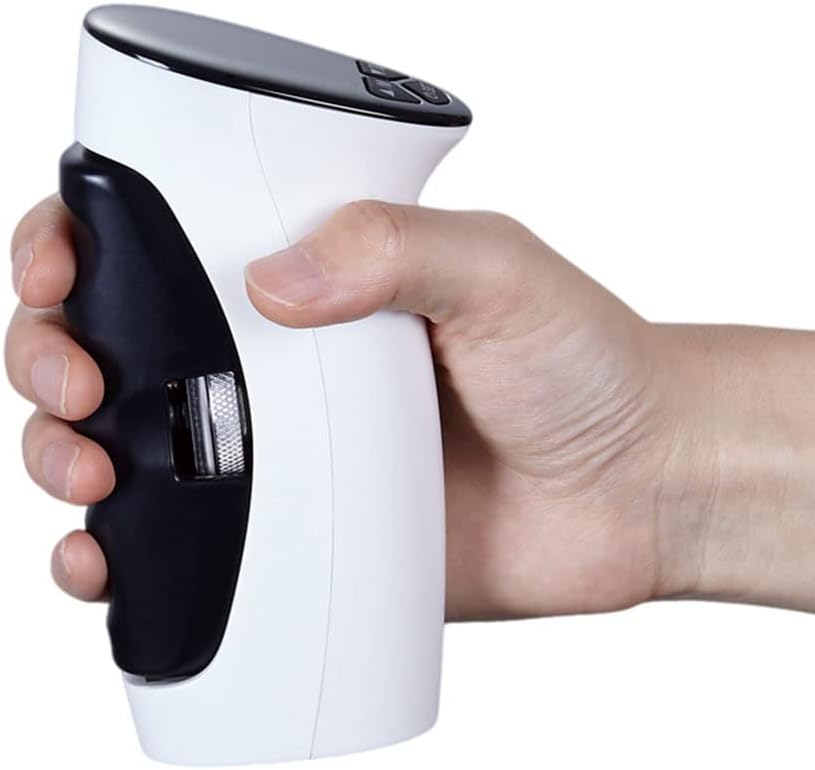 Hand grip trainer held in hand, displaying ergonomic grip and compact design.