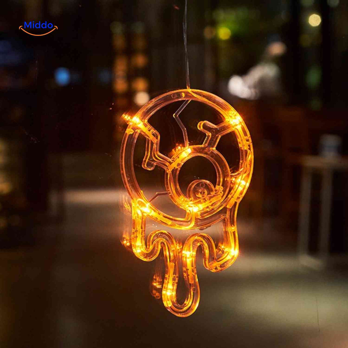 Halloween LED window lamp featuring a creepy glowing eye design for eerie orange window lighting.