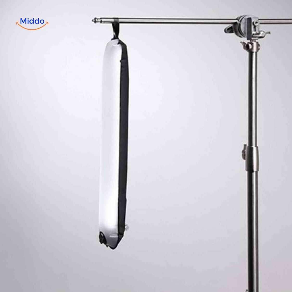 Suspended inflatable LED lamp on professional studio tripod for overhead lighting.