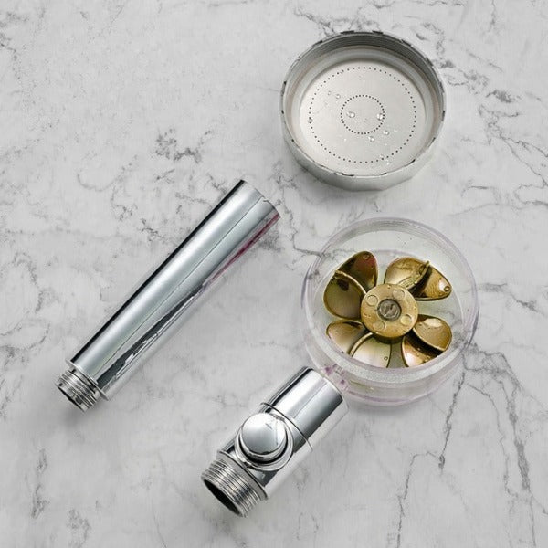 PowerShower shower head components and internal propeller mechanism in detail view