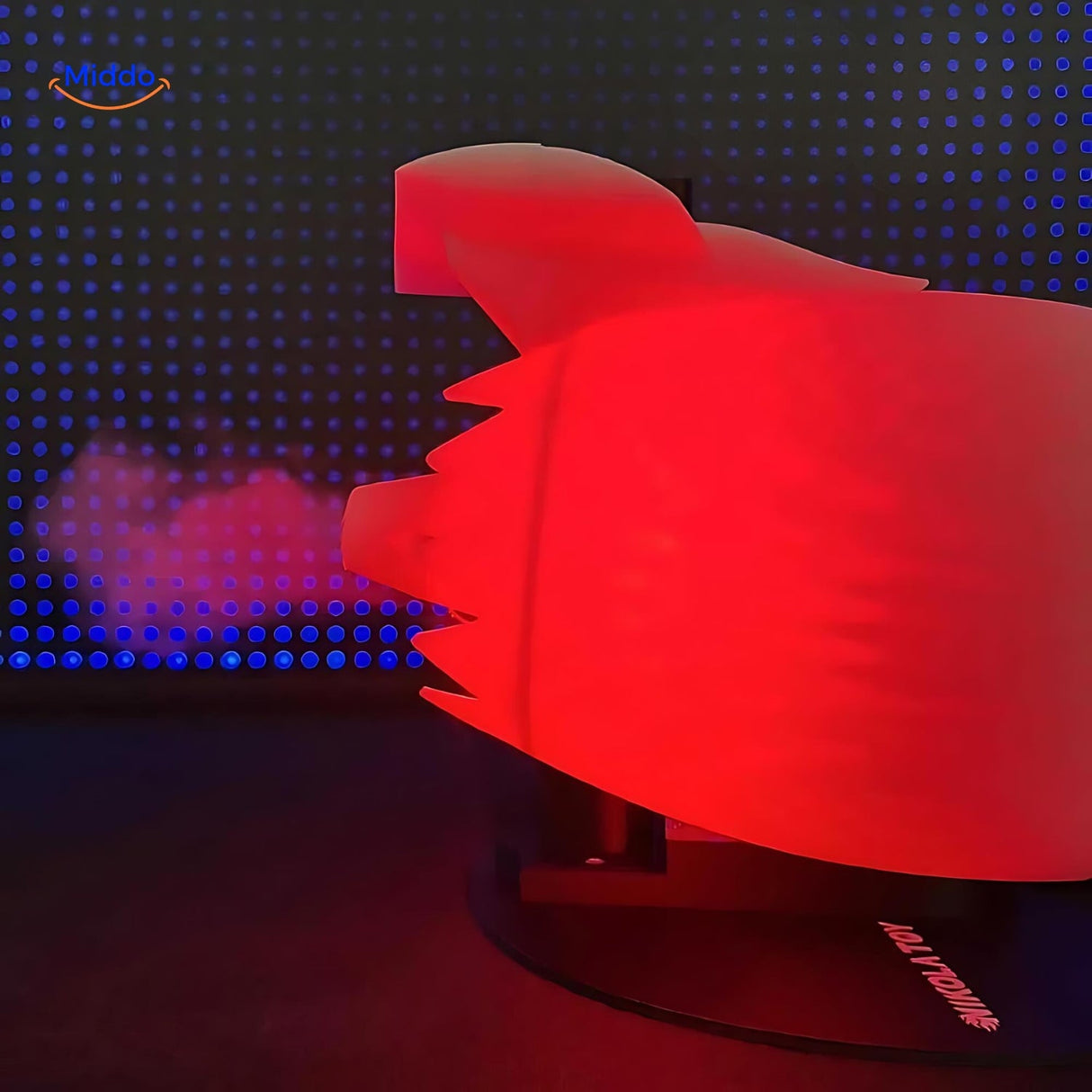 Jetfan turbofan with glowing red tail flame illuminated in dark ambient light.