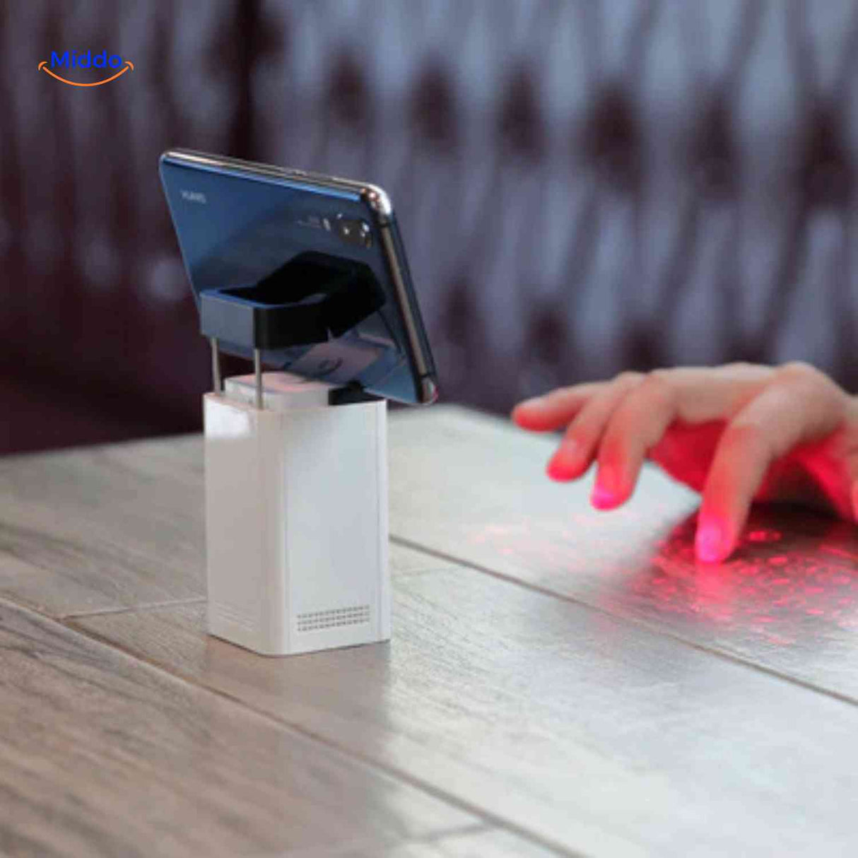 Laser keyboard with integrated smartphone holder for productivity.