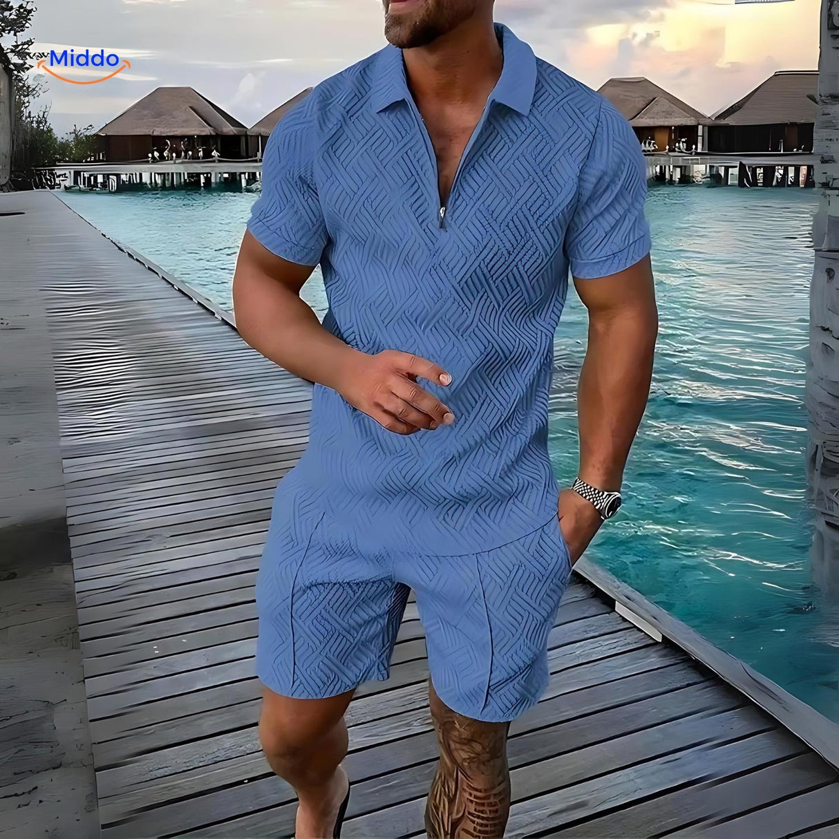 Leander two-piece summer set in peacock blue with breathable shirt and drawstring shorts.