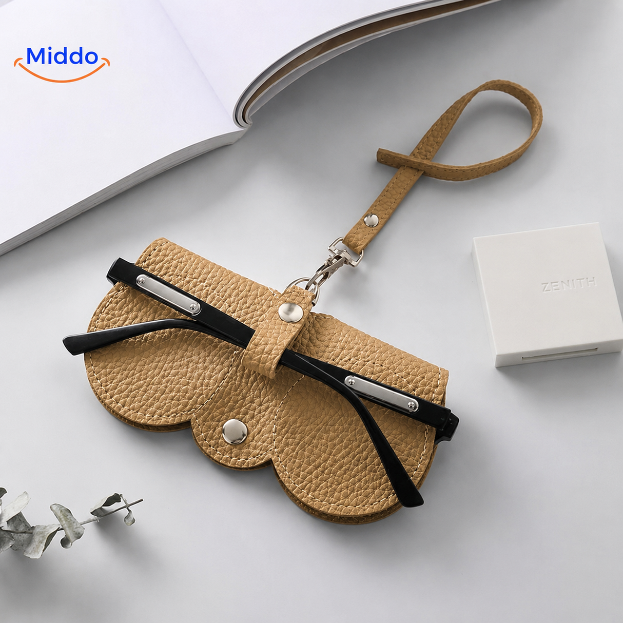 Compact glasses case featuring elegant leather construction for secure eyewear storage.