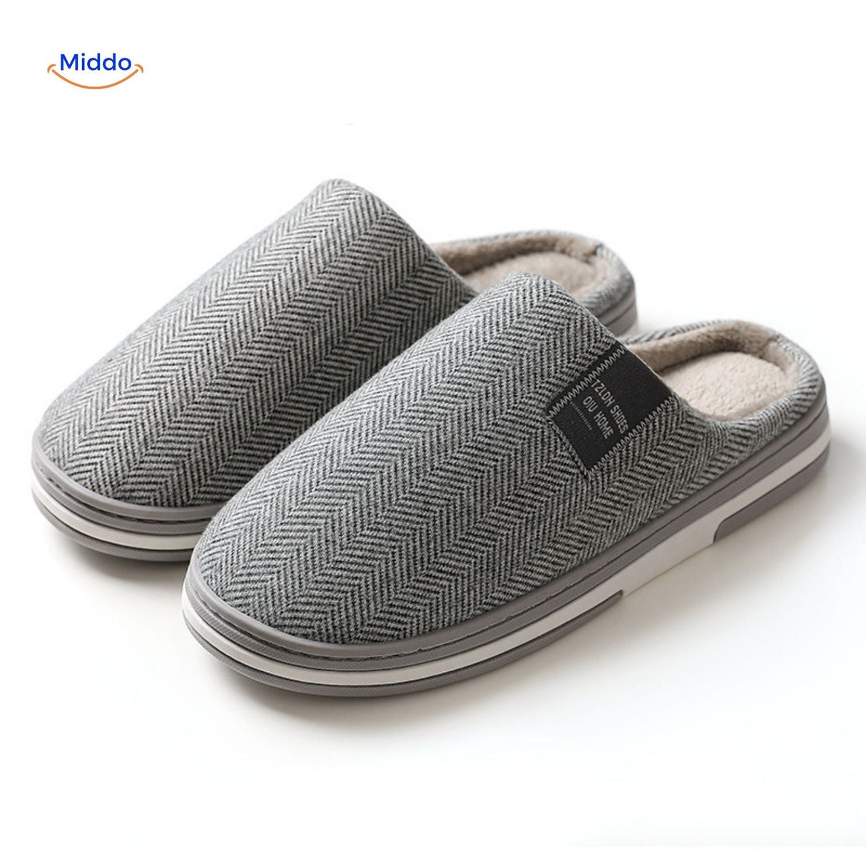 Detailed close-up of light gray cotton slippers material.