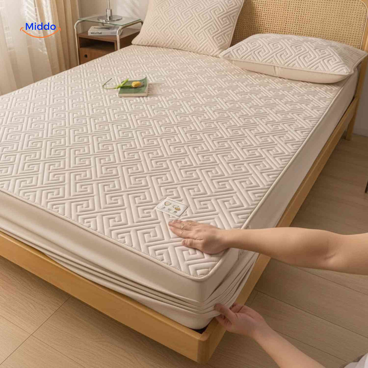Mattress protector with geometric quilted lining design for enhanced durability.