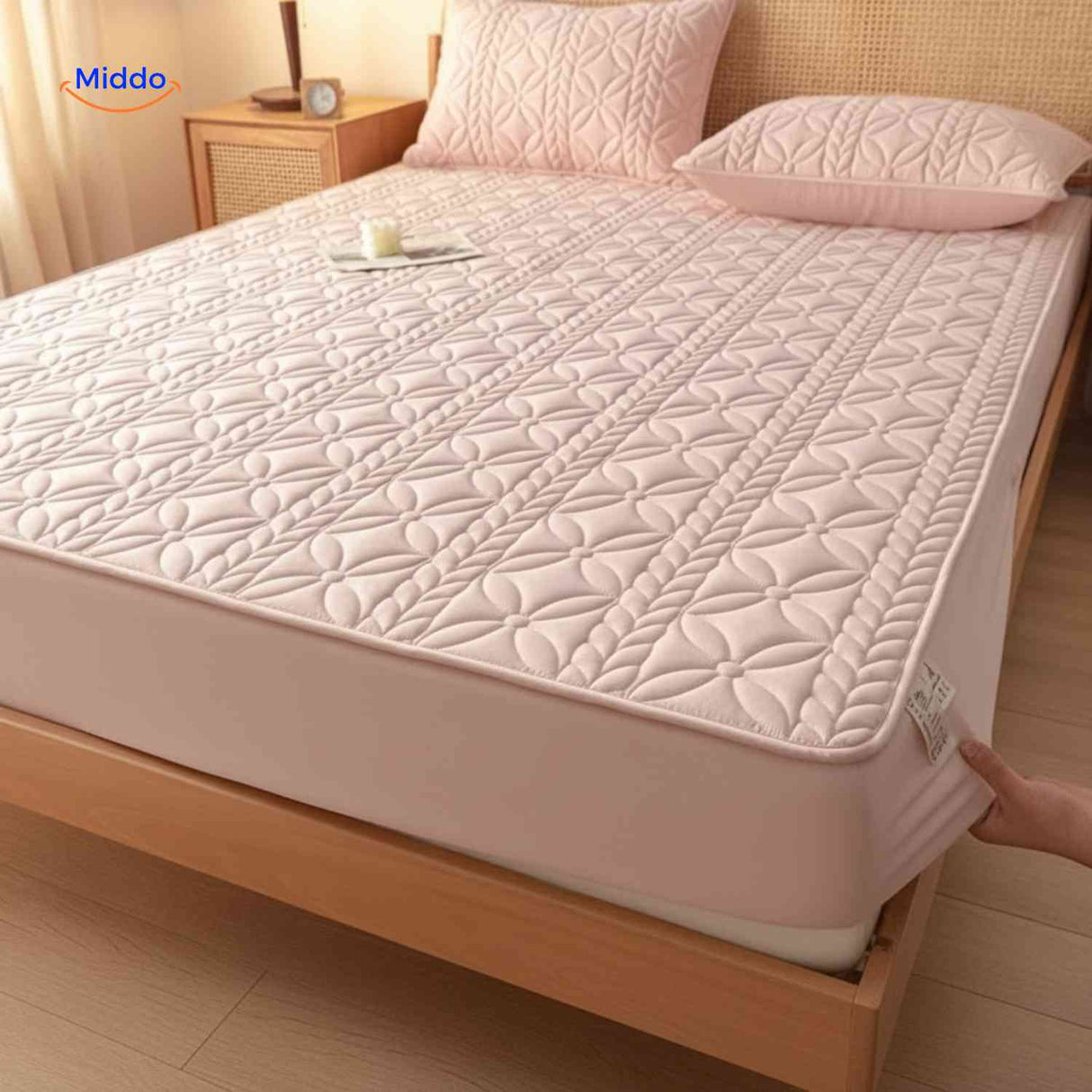 Mattress protector with premium quilted top layer for enhanced protection and comfort.