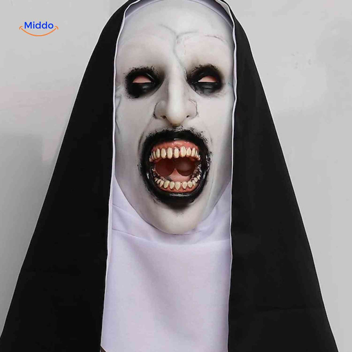 Scary nun mask with open mouth and frightening facial expression.