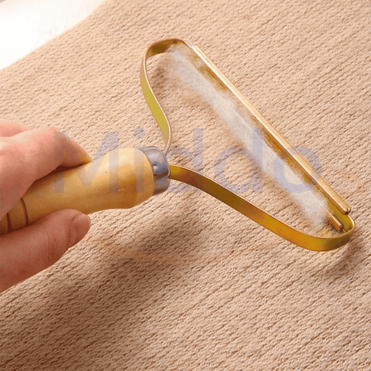 Pet hair remover brush for removing pet fur and lint efficiently.