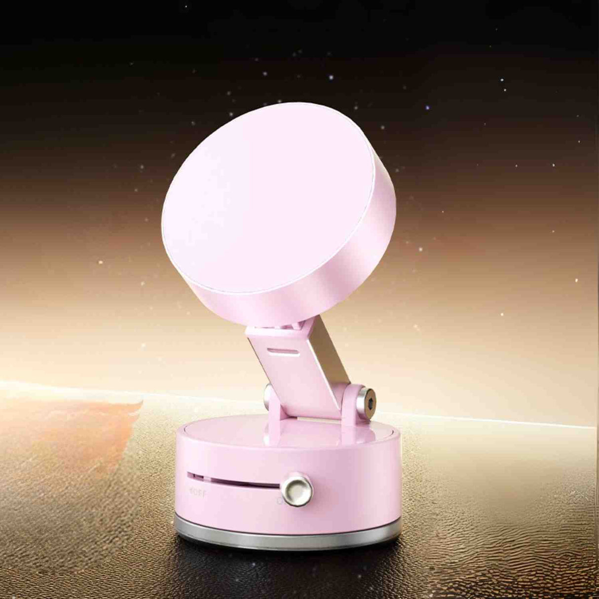 Pink magnetic phone stand for stylish desk or table display.