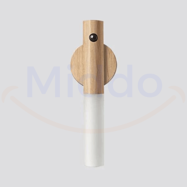 Professional product shot of white motion-activated portable LED lamp.