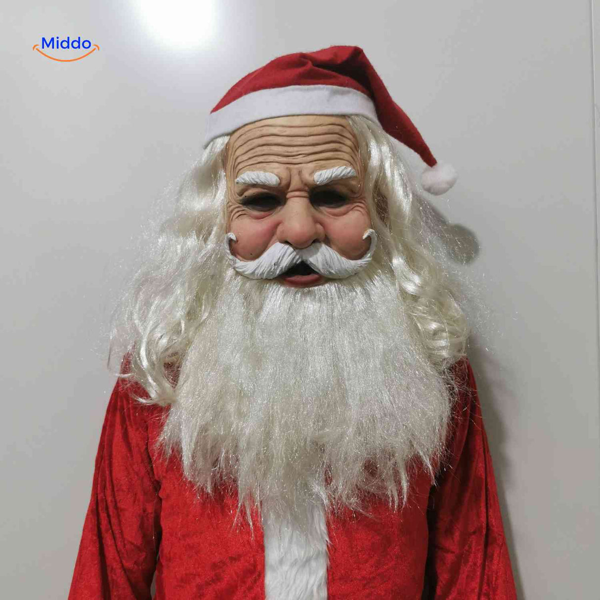 Aged Santa-style latex mask with white beard and holiday costume appeal.