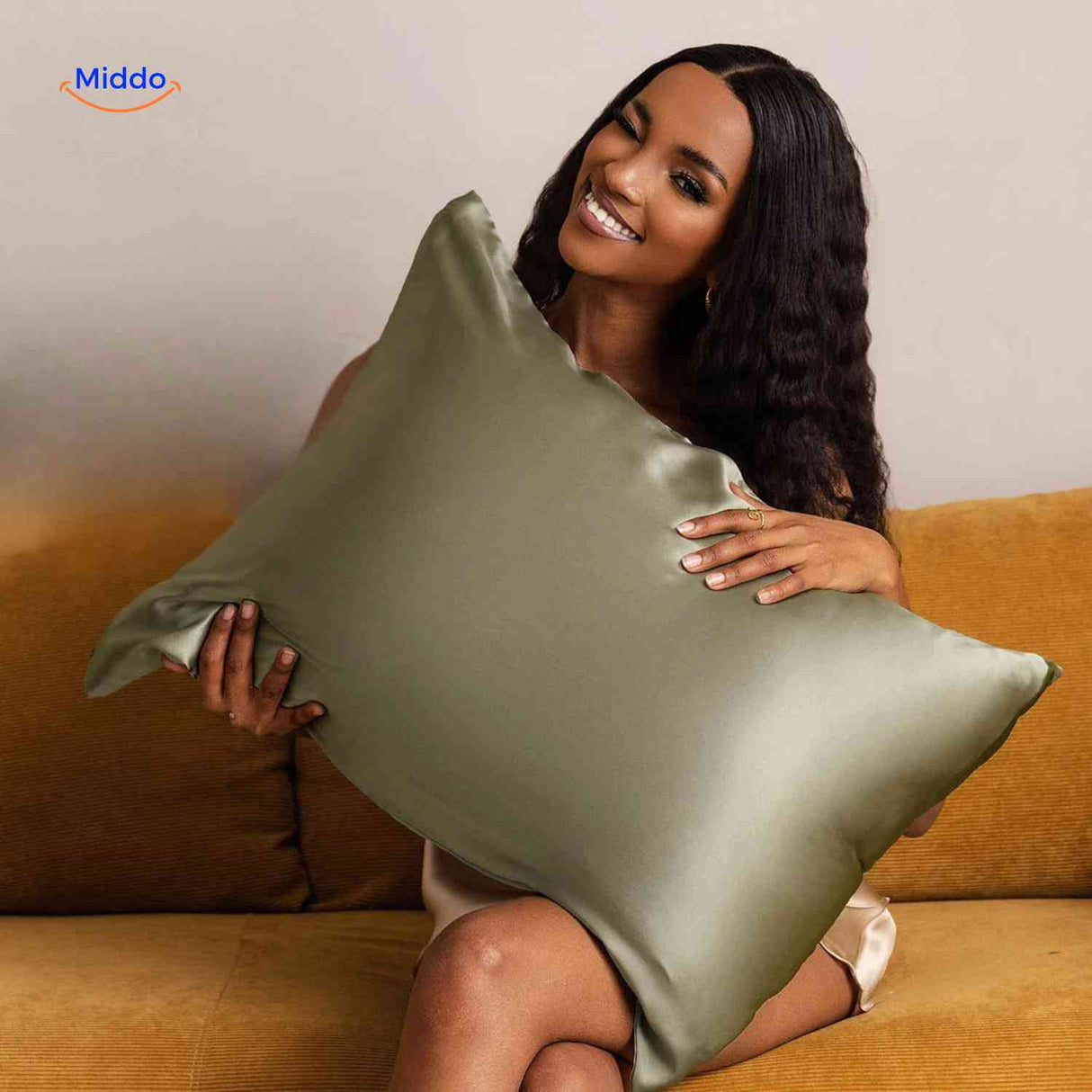 Olive green satin pillowcase on pillow hair care.