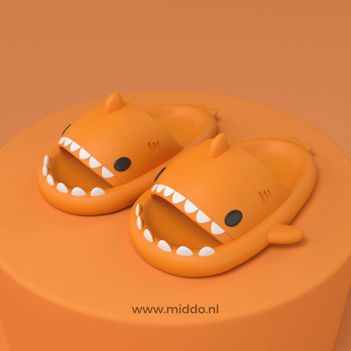 Sharkies shark slippers in orange with non-slip grip sole.