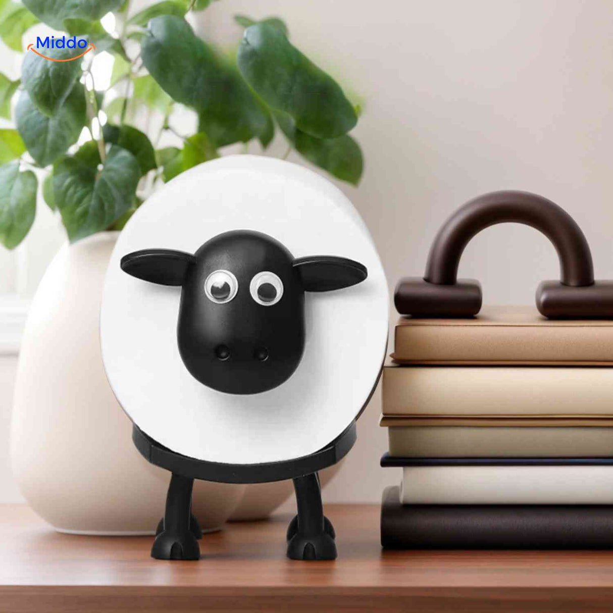 SheepRoll sheep-shaped holder as bathroom decor, creative toilet paper storage piece.