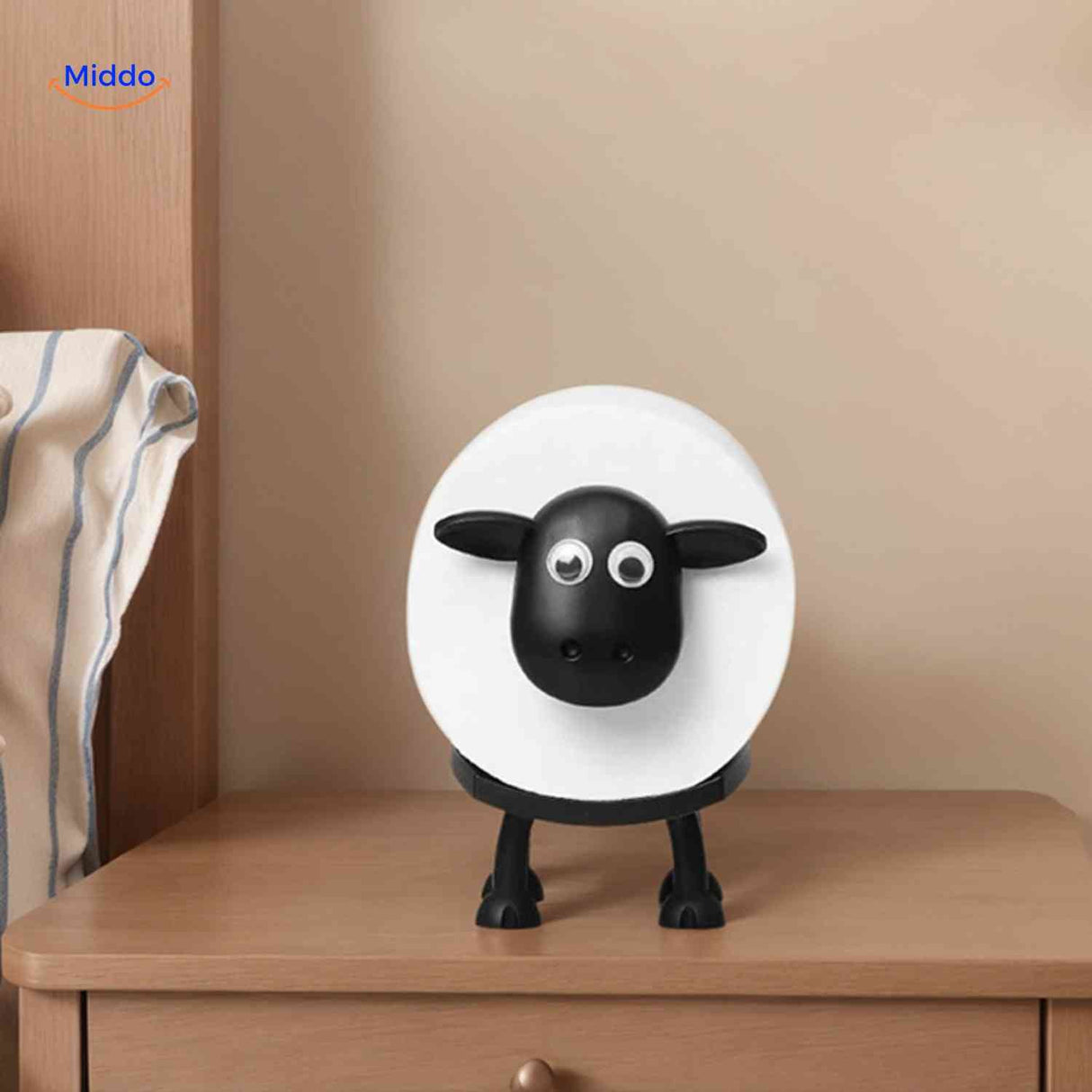 Compact SheepRoll holder with sheep design, space-saving toilet paper organizer.