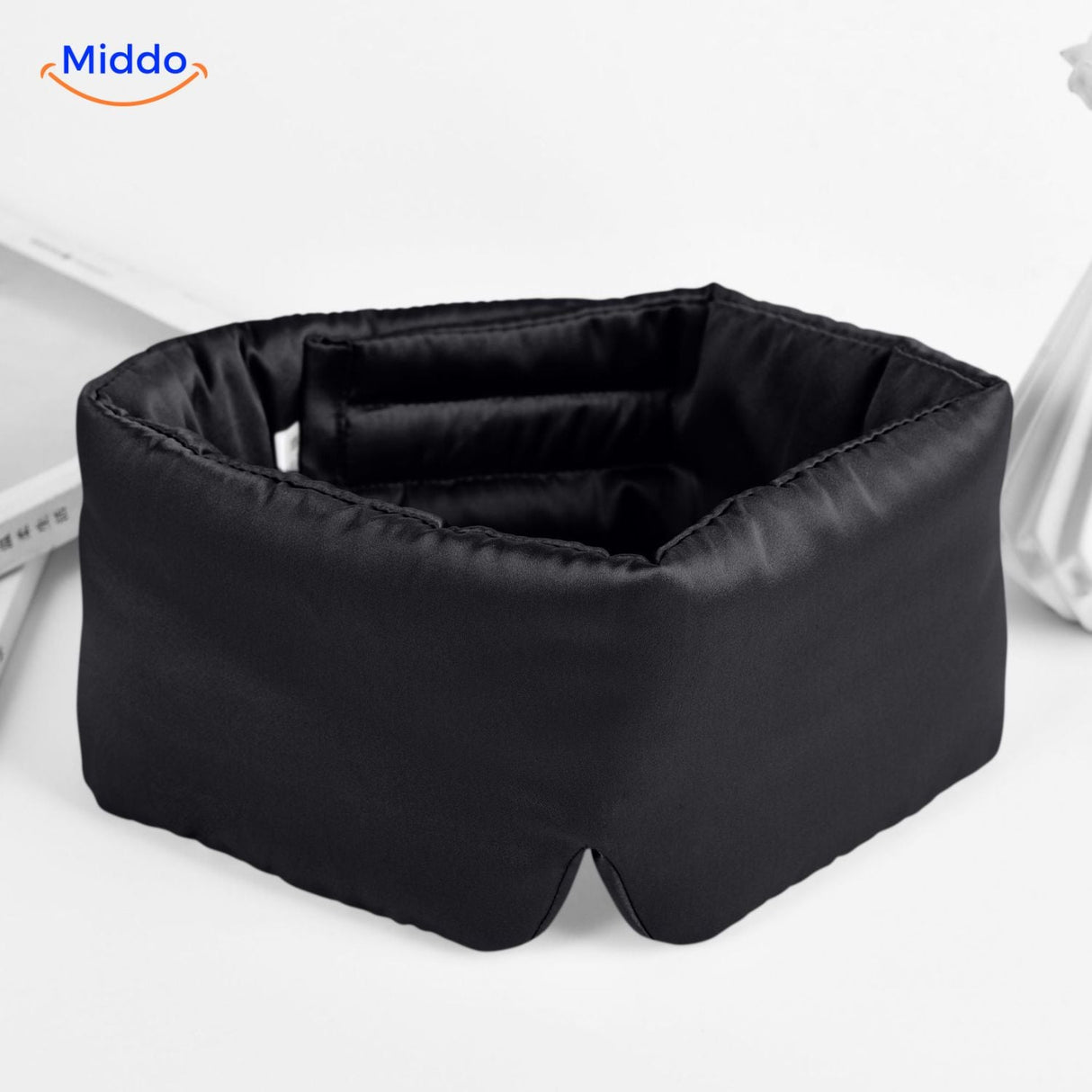 Black mulberry silk sleep mask with soft satin finish for comfortable all-night wear.